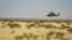 FILE - A Tigre helicopter of France's Barkhane mission in central Mali is seen as the G5 Sahel anti-jihadist force began operations Nov. 1, 2017.