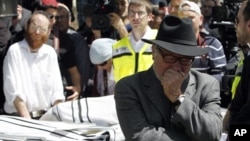 3月21日人们在耶路撒冷为图卢兹枪击案的遇难者举行葬礼