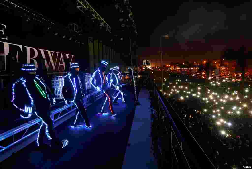 People take part in New Year celebrations at the Waterway in Cairo, Egypt, Dec. 31, 2018.