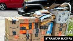 Amazon packages out for delivery in Manhattan, July 30, 2021.