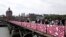 Temporary panels covered of graffiti are seen on the Pont des Arts bridge, in Paris, June 10, 2015.