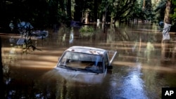 A car   is seen submerged successful  floodwater astatine  Mirabel RV Park & Campground aft  terrible  upwind  successful  Forestville, Calif., Nov. 23, 2024.