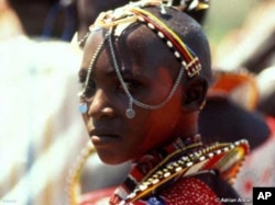A young Massai woman in traditional dress