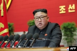 This picture released by North Korea's official Korean Central News Agency (KCNA) Jan. 9, 2021, shows North Korean leader Kim Jong Un speaking at the 8th Congress of the Workers' Party of Korea, in Pyongyang.