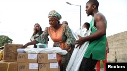 Independent National Electoral Commission ad hoc workers sort election materials in Lagos, Nigeria, March 8, 2019. 