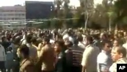 The above photo, obtained by AFP through a third-party source, is said to depict protesters in Deraa, Syria, March 18, 2011