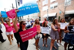 Opponents and supporters of Planned Parenthood demonstrate July 28, 2015, in Philadelphia.