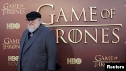 FILE - Co-executive producer George R.R. Martin arrives for the season premiere of HBO's "Game of Thrones" in San Francisco, California.