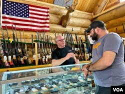 Tim Barnett started his gun store in 2012, and now has an indoor range and a counter dedicated to semiautomatic weapons. (Carolyn Presutti/VOA)
