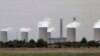 FILE—The cooling towers at Eskom's coal-powered Lethabo power station are seen near Sasolburg, South Africa, on November 21, 2011. 