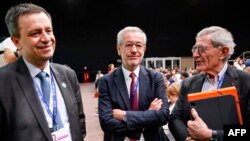 FILE - CEO of France's energy giant EDF Luc Remont (L), Engie's Chairman Jean-Pierre Clamadieu (C) and French manager and businessman Gerard Mestrallet (R) look on during an event at the COP28 United Nations climate summit in Dubai on December 2, 2023.