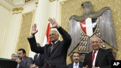 FILE - In this Jan. 10, 2016, photo, Ali Abdel-Al waves after being elected Speaker of Egypt's parliament, in Cairo, Egypt.