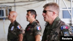 Airmen sing the French national anthem at their military base N'Djamena, Chad, Oct. 26, 2014. Chad's government said Nov. 28, 2024, that it had ended its defense cooperation pact with France.