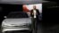 FILE - Derek Jenkins, VP of Design at Lucid Motors, introduces the alpha prototype of the Lucid Air at the 2017 New York International Auto Show in New York City, April 13, 2017.