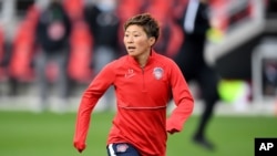 File - Washington Spirit forward Kumi Yokoyama (17) warms up prior to an NWSL Challenge Cup soccer match against the Racing Louisville FC, April 15, 2021, in Washington. (AP)