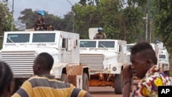 FILE - UN peacekeeping soldiers on patrol in the city of Bangui, Central African Republic. Seleka rebels confronted troops from the U.N. mission in the C.A.R. at a checkpoint in Batangafo after an outbreak of violence between the ex-Seleka and Christian m