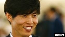 FILE - Human rights activist and North Korean defector Shin Dong-hyuk, smiles before a session of the Human Rights Council on the report of the Commission of Inquiry on Human Rights in North Korea at the United Nations in Geneva.