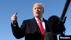 President Donald Trump talks to reporters about journalist Jamal Khashoggi's disappearance prior to boarding Air Force One for travel to Montana from Joint Base Andrews, Md., Oct. 18, 2018. 