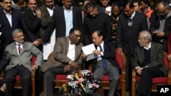 Indian Supreme Court judges, left to right, Justice Kurian Joseph, Justice Jasti Chelameswar, Justice Ranjan Gogoi and Justice Madan Bhimrao Lokur, address media in New Delhi, Jan. 12, 2018.