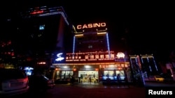 FILE - A restaurant, hotel and casino are seen in Sihanoukville, Cambodia, Sept. 27, 2017.