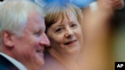 Horst Seehofer ve Angela Merkel