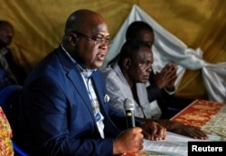FILE - Felix Tshisekedi, leader of Congolese main opposition the Union for Democracy and Social Progress (UDPS) party, addresses a news conference in Limete Municipality of Kinshasa, Democratic Republic of Congo.