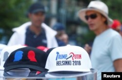 Commemorative caps are displayed during Donald Trump's supporters' demonstration ahead of meeting between the U.S. President Donald Trump and Russian President Vladimir Putin in Helsinki, Finland, July 15, 2018.