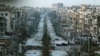 A general view shows a damaged street with sandbags used as barriers in Aleppo's Saif al-Dawla district, Syria, March 6, 2015. The U.S. and Russia say their combined effort to quell unrest in Syria has resulted in a significant decrease in fighting in some areas.