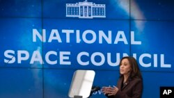 Vice President Kamala Harris speaks, Dec. 1, 2021, during a meeting of the Space Council, at the U.S. Institute of Peace in Washington. 