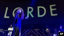 Lorde performs on stage during the 24th Annual KROQ Almost Acoustic Christmas held at the Shrine Auditorium on Dec. 8, 2013 in Los Angeles.