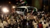 Sudanese demonstrators from the Darfur region chant slogans as they arrive to be part of a mass anti-government protest outside Defence Ministry in Khartoum, April 30, 2019. 