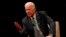 FILE - Former Vice President Joe Biden participates in a discussion on bridging political and partisan divides with Ohio Gov. John Kasich at the University of Delaware, Newark, Del., Oct. 17, 2017.