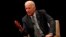 Former Vice President Joe Biden participates in a discussion on bridging political and partisan divides with Ohio Gov. John Kasich at the University of Delaware, Newark, Del., Oct. 17, 2017.