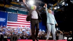 Hilari Klinton i Tim Kejn na današnjem skupu u Majamiju na Floridi, 23. jun 2016.