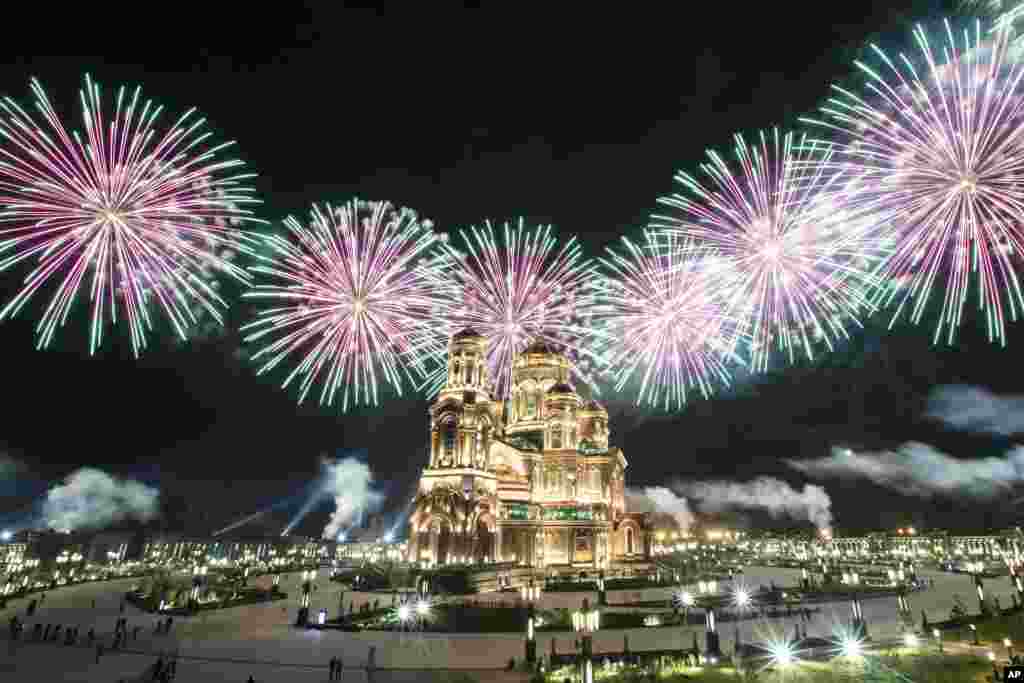 Fireworks explode over the Cathedral of Russian Armed Forces during the Spasskaya Tower military music festival in Kubinka, outside Moscow.