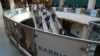 FILE - The logo of sponsor Barrick Gold Corporation is seen as visitors arrive at the Prospectors and Developers Association of Canada (PDAC) annual convention in Toronto, Canada March 4, 2019. 