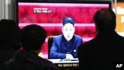 People watch TV showing North Korean leader Kim Jong Un at Seoul Railway Station in Seoul, South Korea, Jan. 23, 2013. 
