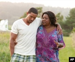 Laz Alonso and Loretta Devine in "Jumping The Broom"