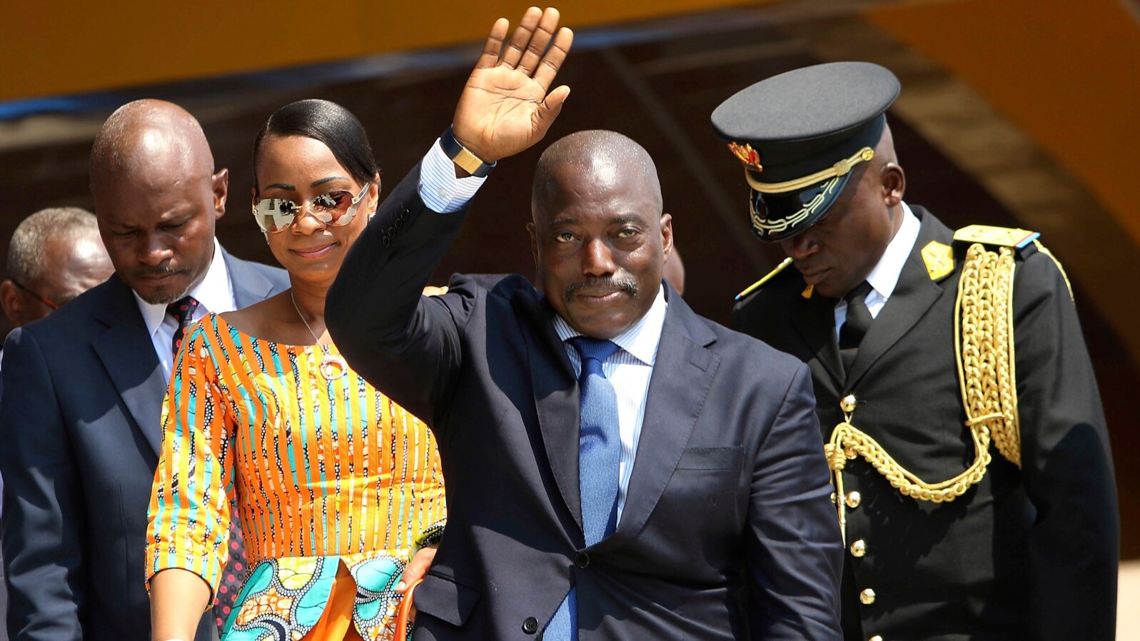 FILE - Congolese President Joseph Kabila, center, waves as he and others celebrate independence for the Democratic Republic of Congo in Kindu, Congo. 