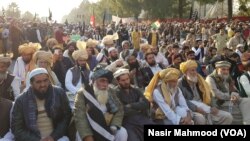 FILE - Tribesmen protest calls for the restive Federally Administrative Tribal Areas, known as FATA, to be merged into the neighboring Khyberpakhtunkhwa (KPK) province, in Islamabad, Dec. 30, 2017