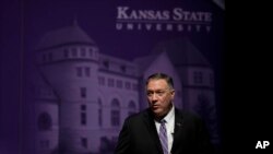 Secretary of State Mike Pompeo answers a question from an audience member after giving a speech at Kansas State University, Sept. 6, 2019, in Manhattan, Kan.