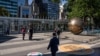 People gather at the plaza at the United Nations headquarters in New York City, Sept. 22, 2024. 