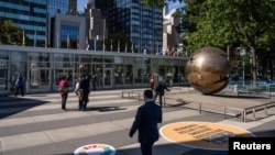 People gather at the plaza at the United Nations headquarters in New York City, Sept. 22, 2024. 