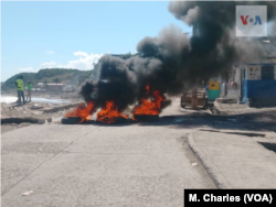 On Feb. 11, 2019, flaming tires block a road in Jeremie in Haiti’s Grande Anse department, located in the southwest.