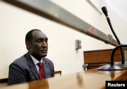 FILE - Exiled Rwandan General Faustin Kayumba Nyamwasa looks on during his court appearance in Johannesburg, June 21 2012.