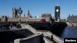 The Houses of Parliament and Big Ben are seen from across the River Thames ahead of Parliament reopening while the spread of the coronavirus disease (COVID-19) continues, London, Britain, April 21, 2020. 