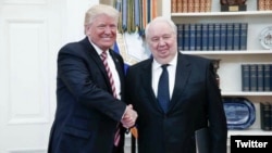 President Donald Trump shakes hands with Russia’s ambassador to the U.S., Sergei Kislyak in this photo tweeted by the Russian embassy.