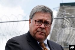 FILE - U.S. Attorney General William Barr speaks to reporters in Edgefield, S.C., July 8, 2019.