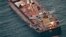 This handout photo made available by India's Press Information Bureau shows the Maltese-flagged MV Ruen.