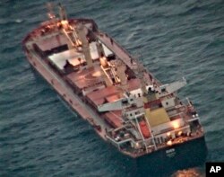 FILE - This handout photo made available by India's Press Information Bureau shows the Maltese-flagged MV Ruen.